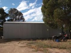 
 62 Railway Terrace East 
 Snowtown 
 SA 
 5520 
 Located just off National Highway 1 close to the Clare Valley, Port Broughton & Port Pirie. 

 The former Snowtown Motors site with a comfortable 4 bedroom home 
attached is on 3 separate blocks and consists of numerous garages, sheds
 and workshops. 

 Potentially this could all be re-opened as a business 

 OR perhaps converted into storage bays to provide caravan, boat, furniture storage. 

 The potential here is unlimited...... over to your imagination! 

 For an inspection please phone Nigel Christie 

 Property Code: 11 
 