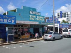  42 Oxley Ave Woody Point QLD 4019 Owner want to retire and instructs to liquidate ! 
 
Hence this excellent rarely available commercial property comprising of 2
 blocks of 1,720 m2 land with shop and house, giving a holding income, 
is ready for development as mixed use of shops and residential high rise
 units.! 
 
Located across the beachfront with parkland and Woody Point Jetty, It 
has the main road frontage as well as a side road which greatly enhances
 the vantage accessibility of this development site.! 
 
However, for the very privileged few, why not consider building a 
luxurious weekend getaway mansion within a lazy stroll to the trendy 
cafes and up market restaurants down the road and enjoy your meals 
watching the beautiful horizon.! 
 
All reasonable offers will be presented to the Vendor for considerations.! 