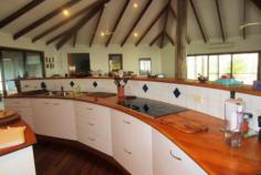  432 Lake Cooroibah Rd Cooroibah QLD 4565 This 2.17 ha site is the setting for this magnificent 8-bedroom home, 
now too large for it's empty nester owners who wish to downsize. 
There is potential for use as a corporate resort, dual home, couples retreat or a B&B. 
The home is surrounded by approx. 1/4 km covered decking which offers 5 
alfresco entertainment areas including a large central breezeway. 
 
Features Include: 
 
506m2 under the roof and 400m2 of covered verandahs 
High Cathedral ceilings, double sliding doors throughout 
Large sitting room with dining area, second area as bar. 
Master suite privately on first floor with dressing room and ensuite 
Second Master suite plus six further bedrooms, 6 bathrooms 
Large working office with access to verandah 
Generous outbuildings, capacity for 11 cars, workshop 
Large resort style pool with waterfall and gazebo 
Dam, solar hot water, 3 phase mains electricity. 
Noosa 12 minutes drive from shops,beaches, schools.
 