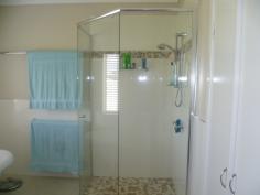  141 Oakview Drive Childers Redridge QLD 4660 Dual Living, Big Family Home on 5 acres...Stop Looking & Inspect! Located 10 mins from Childers, 20 mins to Woodgate Beach and 25 mins to Bundaberg. Built June 2010 this home has stunning features and offers a new owner comfortable dual living and solar to grid as a bonus! House: 4 bedroom Fans and B/I's  Massive gourmet kitchen - Island Bench, Dishwasher, SS Gas Stove, Glass R'hood & Glass Splash Back Beautiful Polished Cypress Pine Flooring throughout the house Huge Lounge Dining Room overlooking the front gates and views Stunning bathroom w/ claw foot bath, shower and country vanity Heaps of storage built ins 3 x 5,000gal tanks Huge Veranda's on 3 sides w/ cypress pine boards Fully Security Screens Vacuum Maid cleaning system throughout house 2.7m high ceilings Liveable Shed: 7m x 8m living quarters, 4.2m x 7m Carport & 3m x 7m patio area 1 bedroom Studio w/ A/C Toilet and Shower Kitchen and dining Lounge Room TV Antenna The block is service with water by a good dam, fire fighter pump and a 2' ring water line with multiple points throughout the yard. Established fruit trees in place and bearing 3.6KW Solar to Grid system 20foot shipping . General Features Property Type: House Bedrooms: 5 Bathrooms: 2 Land Size: 2.04ha (5.04 acres) (approx) Indoor Features Ducted Vacuum System Air Conditioning Outdoor Features Carport Spaces: 1 Garage Spaces: 1 Other Features Balcony, RCDs, Deck, Verandah, Outdoor entertainment area, Dam, Fenced, Granny flat $485,000 