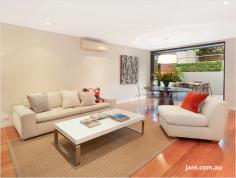  51 Francis St Leichhardt NSW 2040 Generous proportions and bright natural light, define this 
well-designed, freestanding residence situated in a wide, tree-lined 
street moments from Norton Street village and Leichhardt North Light 
Rail station. Spanning two levels, the house has large bedrooms, two 
living areas, alfresco entertainment zones, solar hot water and direct 
access from a secure garage 
 
Large living and dining areas with a seamless flow to a timber decked 
alfresco dining/BBQ courtyard and sunny landscaped garden with level 
lawn 
 
Spacious CaesarStone kitchen with live 5 burner gas range, stainless 
steel range hood, Bosch dishwasher, glass splash backs and pretty garden
 outlook 
 
Sitting room with bespoke cabinetry and library shelving, excellent 
design features include ceiling shadow lines and glass louvres for 
cross-flow ventilation 
 
Downstairs bathroom with frameless glass shower and Caesarstone vanity 
 
Big separate laundry with storage cupboards; another storage area under the stairs 
 
King-size master bedroom has big built-in wardrobe (with pull-down 
double hanging rails), sleek ensuite and balcony overlooking the back 
garden 
 
Two more double bedrooms, both with built-in robes, one with a balcony; 
4th bedroom or study with built-ins, cabinetry, shelves and skylight 
 
Upstairs bathroom features floor-to-ceiling tiles, deep bath and 
separate shower; upstairs hallway with custom-designed cabinet and 
uplighting 
 
Design features include bespoke curtains, pendant lights, custom 
cabinetry, quality carpet, polished hardwood timber floors and glass 
louvres 
 