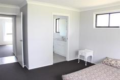  7 Neotsfield Avenue Gloucester NSW 2422 With a commanding presence over the land, this impressive brand new 4 bedroom home incorporates generous room sizes and quality inclusions. Situated on a 1 acre block with northerly aspect, the yard is established with semi-mature trees and substantial timber post & rail fence along the road frontage. Landscaped gardens frame the distant rural views from inside the home. Informal living and kitchen area open out to a level rear yard ideal for entertaining or a great play area for the younger members of the family. Kitchen is fitted with stainless steel appliances and features spacious benchtops with glass splashback, walk-in pantry and 5 burner free-standing gas cooktop/oven. A powder room is located off the living area with the bedrooms having access to a 3-way bathroom and ensuite off the main bedroom. Ducted air conditioning provides comfort throughout all year round. The attention to detail in the planning & construction of this home will be evident to all that inspect this property.  For Sale: $630,000 