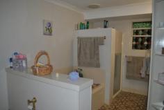  42a Dowell Avenue Tamworth NSW 2340 TUCKED AWAY IN QUIET AVE - CENTRAL EAST! Occupying a prime central East Tamworth location this private family residence sits on a level 721sqm block in a leafy, whisper quiet street within walking distance to Anzac Park, Treloar Tennis club & the CBD. The home is approx. 35 years old & has been well constructed & is erected on a reinforced concrete slab with no movement evident. The brick veneer & terracotta tile home offers a front fence providing excellent security & privacy & also allows an extension of secure yard space, double front gates allow easy access to the double car accommodation, there is a choice of formal & casual living areas in the home which includes lounge, dining, family & meals areas & the very tidy kitchen offers a walk in pantry & dishwasher & is well situated allowing easy access to all living areas. There are 3 bedrooms in total plus an office, the master bedroom offers a dressing room with substantial storage & hanging space & a renovated ensuite, bedroom 2 has a built in with an attached separate room, presently used as a sewing room, bedroom 3 is spacious, the main bathroom presents well & there is a 3rd toilet off the laundry. Additional features include gas log fire, evap. cooling, natural ... show more View Sold Properties for this Location View Auction Results General Features Property Type: House Bedrooms: 3 Bathrooms: 2 Land Size: 721 m² (approx) Indoor Features Alarm System Outdoor Features Carport Spaces: 2 Swimming Pool - Inground Other Features Built-In Wardrobes,Close to Schools,Close to Shops,Close to Transport,Garden AUCTION 