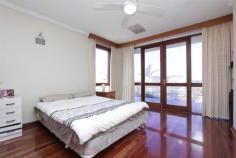  13 MACCABEAN AVENUE , DIANELLA WA 6059 OPEN SATURDAY 8th Nov 12 -12.30pm Set on 781 sqm of prime real estate, this charming home oozes natural light and huge potential. From the main entrance you walk through to the airy and open lounge room adorned with French Wooden windows and doors to let the natural light and elevated view stream in. The spacious open plan Tasmanian Oak kitchen overlooks the meals and living room which leads onto the private and luscious back garden complete with birds and trees and an all season covered alfresco. The home has been designed around capturing the elevated views of the Perth hills with balconies on all the front rooms. $909,000 to $949,000 