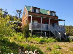  5206 Channel Highway Gordon TAS 7150 Charming Cottage Amazing Water Views Have you been looking for that wonderful cottage overlooking the ocean, and then this is for you. With great charm and ambience this 3 bedroom home is just perfect for that sea change whether you are thinking of a permanent change or just a haven. Walk in and relax, open a bottle of something cold, add a platter of Tasmanian's finest foods, the one you love and sit and take in the amazing views and watch the ever changing light play over the water. With 3 light and cosy bedrooms up stairs all with storage and each have lovely view, makes having friends and family over so easy. Take a stroll down to the rocky beach, go fishing, watch the wild life and feel the stresses of life wash away. Sitting up on 1115sqm block with charming gardens, good fencing, and a garden shed and chook house this is a great package. Add to all of this a front verandah which is great for entertaining or watching for dolphins as they glide by. Situated not far from local store, boat ramp, sandy beaches and Marine Park and only 40 minutes to Kingston and 55 to Hobart. A must see. General Features Property Type: House Bedrooms: 3 Bathrooms: 1 Building Size: 69.00 m² (7 squares) approx Land Size: 1115 m² (approx) Outdoor Features Balcony Shed Other Features Balcony, External Water Feature, Shed, Water Views $235,000 