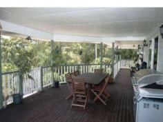 34 BAILEYS MOUNTAIN RD Willow Vale Qld 4209 WILLOW VALE’S HIDDEN TREASURE UNLIMITED POTENTIAL FOR THE ASTUTE BUYER Secluded and private, set high to catch the breezes yet just a few short minutes to the M1. This
 amazing property situated on 7.5 undulating acres offers tranquil 
valley views and for the astute, a potential income from the 200 tree 
Lychee Orchid. The original, high set quality built steel framed home
 boasts stunning timber flooring, 5 good sized bedrooms, the master with
 ensuite and walk through wardrobe, spacious elevated covered wrap 
around entertaining deck over looking the sparkling fully fenced pool. Down stairs providing garaging for up to 3 cars plus one bedroom self contained dual living opportunity. Although
 in need of a little TLC the orchid with irrigation in place could 
provide potential income from the well established fruit bearing trees 
and a large dam. Or just simply land bank and reap the rewards in 
this forward moving sort after location only 5 minutes from a selection 
of both private and state schools, a variety of shops, medical 
facilities and transport.. Presently tenanted with excellent returns the choices are yours to make. Call to arrange your private inspection today. View Sold Properties for this Location View Auction Results 