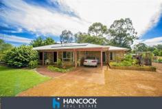  11 Jilley Road Gelorup WA 6230 YOUR PRIVATE SANCTUARY An incredible opportunity to acquire 5 acres of private tranquillity surrounded by natural bushland, paddocks, magnificent established gardens, an assortment of sheds, chooks, fruits trees and a huge patio to sit under and soak it all up. This very well kept 3 bedroom rural retreat doesnt forgo modern conveniences. It has NBN Telstra coverage, a 90,000Lt rainwater tank and solar panels so NO electricity bills! The home makes the most of its stunning surroundings with plenty of natural light seeping through the house with the use of a skylight and a beautiful bay window in the kitchen, inviting the picturesque setting inside. Intricate decorative ceillings, a wood fire place and exposed brick work are just some of the many features of this lovely home.  Perfect haven for those wanting a peaceful, private surrounding without being too far from the City. View Sold Properties for this Location View Auction Results General Features Property Type: House Bedrooms: 3 Bathrooms: 1 Outdoor Features Carport Spaces: 1 Garage Spaces: 2 From $549,000 