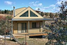  18 Acacia Place East Jindabyne NSW 2627 Over half and acre with lake views. This spacious family home sits on 2574m2 of land at the end of a cul de sac. It offers great views of the lake and mountains and just needs you to move in. Spend you summer afternoons by the lake and your winters looking over the lake to the snow-capped mountains. Warmed by a slow combustion fire, and with timber floors throughout, the home has a real country feel. Downstairs are the living areas with high raked ceilings, two bedrooms, a bathroom, and a laundry with back door access. Upstairs is the huge master bedroom has built ins, an ensuite and its own balcony. Another bedroom is adjacent to this bedroom. Depending on the size of your family this upstairs bedroom could be a study making the whole upstairs area a parents retreat. The large block is perfect for the gardener and offers plenty of room for the kids and pets. Under the house has plenty of secure storage and could easily be a workshop. Property Code: 334 View Sold Properties for this Location View Auction Results General Features Property Type: House Bedrooms: 4 Bathrooms: 2 $449,500 