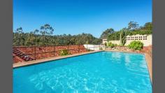  34 N Arm Rd Middle Cove NSW 2068 Waterfront Family Home. First Time Offered In 55 Years Immaculately presented and beautifully maintained family home offered for sale by the original owners. Positioned in a private and secluded setting directly opposite a waterfront reserve and enjoying elevated tranquil views of Sugarloaf Bay with a north/east aspect. Spacious and sunny lounge flows through expansive glass sliding doors to the north facing verandah capturing uninterrupted water and bushland views. Surrounded by immaculate gardens, this wonderful home is footsteps to the water's edge via Harold Reid Reserve and foreshore walk. And only 8 kms to CBD. * Family friendly with single level living * Timber kitchen in excellent condition * Dining flows to family room & separate study * Terraced outdoor entertaining area at rear * Double garage with storage & internal access * In-ground pool with change room facilities * 5 mins drive to Castlecrag & Chatswood * Only 8 kms to CBD 