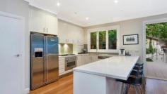  7 Ellalong Rd Cremorne NSW 2090 This beautifully presented Federation home is situated on a uniquely large, level parcel of land and has been renovated whilst preserving fabulous period features. It is located in a quiet, leafy pocket of North Cremorne, close to Neutral Bay village amenities and easy access to the CBD. Accommodation includes; four generous sized bedrooms and with the option of a rumpus or study, formal living and dining with high ornate ceilings as well as informal, open plan living/dining areas flowing onto a wonderful rear garden with a heated pool. There is natural light throughout and a commanding sense of space. To complete, there is a garage and a carport with space to park four cars, and ample internal storage. It is conveniently placed for local schools, foreshore walks, cafes, restaurants and city buses. 