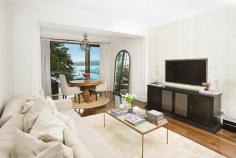  4/585 New South Head Road Rose Bay NSW 2029 Property Description Harbourfront Glamour With Panoramic Views, House-Like Proportions & Bespoke Inte A fresh vision of urban glamour with a chic New York inspired design aesthetic, this custom recreated harbourfront apartment is set against a mesmerising harbour backdrop with panoramic northerly views over Rose Bay Marina. With nods to Hollywood and its Art Deco heritage, it has been meticulously recreated showcasing exceptional detail throughout from the state-of-the-art kitchen and luxurious marble bathrooms to the bespoke joinery and timber-panelled walls. Facing north and opening through double glazed glass to a view-swept terrace, it features a semi-like layout with more than 130sqm of in/outdoor living space. Mid floor setting in a revamped Art Deco block of 8 Exclusive harbourside setting overlooking Rose Bay Marina  Fluid open living and dining, Kelly Wearstler wallpaper Custom entertainer’s island kitchen, fully integrated Wraparound terrace with never-to-be-built-out views 3 double beds with built-ins, luxurious master suite  2 luxurious baths featuring Calcutta & Carrara marble finishes Internal laundry, integrated sound, ducted reverse air Walnut polished timber floors, terrazzo foyer, lift access 