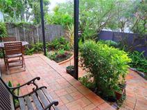  30 Birt Avenue, Budds Beach, Surfers Paradise QLD 4217 Own a Piece of Paradise! Budds Beach Villa $549,000 Located in the highly sought after inner Surfers Paradise riverside enclave of Budds Beach is this extremely rare opportunity to secure a 2 bedroom, 2 bathroom single level villa. The unique offering would be perfect for investors or owner occupiers being well sized throughout and perfectly positioned metres from the river, cafes, and the Surfers Paradise CBD.  The villa is all on one level and features a large private North facing terrace that leads from the living and dining areas. The kitchen is open plan and well-appointed and both bedrooms are well sized, the main featuring an ensuite.  - Private North facing terrace with water glimpses  - Large living and dining areas  - Two generously-sized bedrooms both with mirrored built-ins wardrobes  - Two renovated bathrooms, including separate oversize shower and bath - Master bedroom featuring a large ensuite as well as a walk-in wardrobe  - Open plan kitchen with plenty of bench space featuring a new dishwasher - Separate laundry, single lock up garage + off street car space - Security screens and new awnings, loads of storage - Newly installed reverse-cycled air conditioner as well as fans throughout Perfectly positioned at the river end of Budds Beach, metres to family-friendly parks and beaches, the popular Bumbles café and the new lightrail, this spectacular villa offers the ultimate in private central Surfers Paradise living and is a must to inspect as it is priced for a quick sale. 