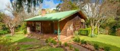  51 Church St Burrawang NSW 2577 4 Bedrooms For Sale : $749,000 HIGHLANDS COTTAGE Situated in the historic township of Burrawang, this two-level cottage has so much character to offer ... external shingles, vaulted ceilings, two fireplaces plus slow-combustion fire, polished boards, English paned windows and more! There are four bedrooms, two living areas, a study space and a mezzanine above the lounge, as well as a country-style eat-in kitchen with welcoming corner nook. Every window offers leafy views of the English-style garden with stepping stones and enchanting places to sit and ponder. The home faces due north and catches tons of winter sun. The large ¾-acre block and a double auto garage complete this attractive package. Just listed today! Viewing by appointment. Outgoings per annum:  Council: $ T.B.A  Water:  $ T.B.A 