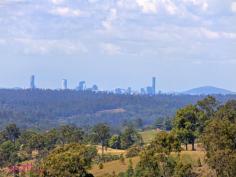  Clear Mountain, QLD 4500 Mountain solitude with city views! Live
 in this amazing nature haven…while still being just over 10 minutes 
drive to Albany Creek. Around 200 metres past the Mercure Clear Mountain
 Lodge and you’re home! Ok…so maybe you’ll stop there for lunch first….then, you’re home. Living
 onsite on this secluded 5.5 acres (the highest land for sale on Clear 
Mountain right now) while you build, is the smart plan. There are house 
plans already available! Straight away the kids can be exploring 
the creek and rock pools at the bottom boundary. They may even spot the 
resident fireflies, wallabies and owls in the rainforest pockets. You, 
on the other hand, can be enjoying the twinkling city lights, magical 
sunrises, full moons and relaxing nights watching the flickering flame 
of your log fire. You can even see the Riverfire fireworks from here! The
 American style barn is a council and plumbing approved 11 x 12 m 
Totalspan. Complete with a galley style kitchen, a family bathroom and 
open plan, tiled living with a fireplace. All the separate internal 
rooms, upstairs and down, are lined, carpeted, insulated and air 
conditioned. The current owner used these as 4 bedrooms. Planned 
to perfection….the 2ND 12 x 6 metre double lock up shed has 3 phase 
power, there are 2 tanks and a septic wastewater system built to cater 
for a 4+bedroom house when built. Check out the huge list of 
inclusions….. Mountain solitude with city views!
 		 Live in this amazing nature haven…while still being 
just over 10 minutes drive to Albany Creek. Around 200 metres past the 
Mercure Clear Mountain Lodge and you’re home! 
Ok…so maybe you’ll stop there for lunch first….then, you’re home. 
 Living onsite on this secluded 5.5 acres (the highest land for sale 
on Clear Mountain right now) while you build, is the smart plan. There 
are house plans already available! 
 Straight away the kids can be exploring the creek and rock pools at 
the bottom boundary. They may even spot the resident fireflies, 
wallabies and owls in the rainforest pockets. You, on the other hand, 
can be enjoying the twinkling city lights, magical sunrises, full moons 
and relaxing nights watching the flickering flame of your log fire. You 
can even see the Riverfire fireworks from here! 
 The American style barn is a council and plumbing approved 11 x 12 m 
Totalspan. Complete with a galley style kitchen, a family bathroom and 
open plan, tiled living with a fireplace. All the separate internal 
rooms, upstairs and down, are lined, carpeted, insulated and air 
conditioned. The current owner used these as 4 bedrooms. 
 Planned to perfection….the 2ND 12 x 6 metre double lock up shed has 3
 phase power, there are 2 tanks and a septic wastewater system built to 
cater for a 4+bedroom house when built. Check out the huge list of 
inclusions….. - See more at: http://www.wattrealty.com.au/listings/land_sale-244251-clear-mountain/#sthash.U7scrDFw.dpuf Mountain solitude with city views!
 		 Live in this amazing nature haven…while still being 
just over 10 minutes drive to Albany Creek. Around 200 metres past the 
Mercure Clear Mountain Lodge and you’re home! 
Ok…so maybe you’ll stop there for lunch first….then, you’re home. 
 Living onsite on this secluded 5.5 acres (the highest land for sale 
on Clear Mountain right now) while you build, is the smart plan. There 
are house plans already available! 
 Straight away the kids can be exploring the creek and rock pools at 
the bottom boundary. They may even spot the resident fireflies, 
wallabies and owls in the rainforest pockets. You, on the other hand, 
can be enjoying the twinkling city lights, magical sunrises, full moons 
and relaxing nights watching the flickering flame of your log fire. You 
can even see the Riverfire fireworks from here! 
 The American style barn is a council and plumbing approved 11 x 12 m 
Totalspan. Complete with a galley style kitchen, a family bathroom and 
open plan, tiled living with a fireplace. All the separate internal 
rooms, upstairs and down, are lined, carpeted, insulated and air 
conditioned. The current owner used these as 4 bedrooms. 
 Planned to perfection….the 2ND 12 x 6 metre double lock up shed has 3
 phase power, there are 2 tanks and a septic wastewater system built to 
cater for a 4+bedroom house when built. Check out the huge list of 
inclusions….. - See more at: http://www.wattrealty.com.au/listings/land_sale-244251-clear-mountain/#sthash.U7scrDFw.dpuf 