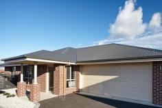  2/11-13 Edith Court Legana TAS 7277 LEGANA GROVE ESTATE Large New Unit! Positioned in a prime new area of Legana this large new three bedroom townhouse is positioned in a quiet cul-de-sac within walking distance to shopping complex including a Woolworths Supermarket and many other specialty shops. Extra large living areas including beautiful kitchen with soft close drawers and cupboards and Westinghouse appliances including dishwasher and wall oven.  Spacious main bedroom with en-suite and all three bedrooms with built-in wardrobes. Reverse cycle heating and cooling (heat-pump) to keep you at a comfortable temperature all year around. Double garage with store room, remote control door and direct access to inside. Fully landscaped and low maintenance. Wheelchair friendly. You get to choose the carpet! A stunning large new unit in prime position. General Features Property Type: Unit Bedrooms: 3 Bathrooms: 2 Building Size: 201.60 m² (22 squares) approx Indoor Features Ensuite: 1 Outdoor Features Garage Spaces: 2 $330,000 