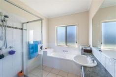  5 Rosefinch St Upper Coomera QLD 4209 ***To arrange to take a closer look contact Colleen Sutherland on 07 5535 8854 or 0438 620 511***  This well presented, 4 bedroom home is positioned in an easily accessible pocket of Upper Coomera. It is in a perfect location for the busy family. This home is in a well established “young” estate of Upper Coomera. High ceilings enhance the spacious look of the home. The comfortable, open-planned living is a spacious area and balances with the high ceilings & clean neutral coloured walls. It all contributes to the character of this home with its relaxed feel and is easy to maintain. The tiled floor allows a good flow from the dining room overflowing onto the covered entertainment area. For the young family there is plenty of bedroom space for study, sleep and play. Outdoor living on a level block is ideal to put your feet up and chill out. The outlook from the back yard is private and gives the heightened sense of privacy to this home. This simple and functional home is rock solid with hardwood timber and block brick work. 