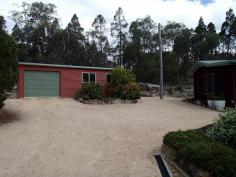 66 Dalcouth Road Stanthorpe Qld 4380 3 BEDROOM, 2 BATHROOM HOME ON JUST UNDER AN ACRE 
							Bordered by lovely gardens and lawns is this charming 3 bedroom 
western red cedar home, less than 5 mins from town on just under an 
acre. Featuring an open plan living design with the lovely pine kitchen 
overlooking the lounge and dining areas, this home also boasts three 
built-in bedrooms, WIR off the master, two bathrooms, a well positioned 
enclosed sunroom and a large front verandah overlooking the gardens and 
pond. Also boasting wood heating plus reverse cycle air conditioning, a 
6m x 9m single remote lock-up garage with plenty of storage/workshop 
space, 9,400 gallons of rainwater and a covered barbeque area, this 
property represents true value for money and an inspection is highly 
recommended. Contact Scott Mann on 0427 814 444 or Simon Leigh on 0418 
790 070 to arrange an inspection.