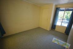  1 12 Lawton Lane, Canungra QLD 4275  Rarely available is this neat and tidy 2 bedroom lowset brick unit centrally located in the Canungra Township.  Quiet block of 3 units. Combined air-conditioned living and kitchen area, 2 double size bedrooms with built in robes, tiled throughout.    Large entertainment deck at the rear with covered verandah rear and front patio area.    Separate Laundry and small storage area.  Good size yard area, partly fenced. 