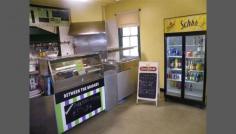  81 Henry St Quirindi NSW 2343 Offers Over $155,000 BUSINESS & RESIDENCE PRICE REDUCED Takeaway caf including a 2 bedroom residence in a highly visible location on a main thoroughfare. Extensive list of cafe inclusions including cool room, cooking appliances & ducted evaporative A/C. Cafe includes kitchen, service area, dining room with rev cycle A/C & storage room. Residence includes kitchenette, bathroom, dining room & wood heater. Large building behind cafe with laundry, 2nd toilet & huge storage area. Side vehicle access for deliveries.  For further information please contact Luke Scanlon 0419495147, Ray White Quirindi on (02) 67461270, or visit our website at www.quirindi.com.au 