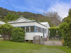  1 Mulhall St Wagstaffe NSW 2257 For Sale New to Market Features General Features Property Type: House Bedrooms: 2 Bathrooms: 2 Land Size: 229 m² (approx) Outdoor Courtyard Built in 1940, this original cottage enjoys a serene waterside locale and is the idyllic Coastal hideaway. Featuring: -Sunroom at front of home with louver windows and water views  -Open plan kitchen, dining and living  -Neat bathroom with bathtub  -Two bedrooms with built in wardrobes and ceiling fans  -Private paved courtyard, fully fenced yard  -External laundry/second bathroom, ample storage  -Located next to local store and close to Palm Beach Ferry  -Ideal weekender, holiday house, investment or first home Inspections Sat, 08 Nov 11:15 AM - 11:45 AM 