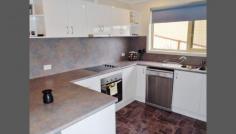  5/23 Heather Crescent, Park Grove, TAS 7320   $249,000 Presented is this very level Unit, approx 97m2,and located in a beautiful, quiet and peaceful, natural bush rural setting, elevated with relaxing urban and parkland views. Features Include: *2 large and spacious bedrooms with large built-in robes *Light and very spacious open plan lounge and dining *Excellent kitchen, ample bench space & cupboards plus dishwasher *Large Bathroom *Internal laundry *Large Decking for fresh air, sun and shade *Carpet in bedrooms *Single lockup garage, internal access, storage area *Extra parking in front of unit plus extra visitor parking 