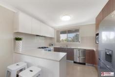  3/12 Margate Ave Holsworthy NSW 2173 Combining Looks, Lifestyle and Location, is this immaculate and modern 3 level home situated in the popular Mornington Estate, just a stone's throw away from Holsworthy Station. Boasting the following items of interest; - 3 good sized bedrooms, 2 with ceiling fans - Main bedroom providing Walk in robe and Ensuite - Modern Kitchen with ceaser-stone bench tops, S/Steel gas appliances and double drawer dishwasher - Spacious open plan living with floating timber floors - Ducted A/C, Alarm and Video Intercom - Singe remote garage - Roof terrace leading onto rear low maintenance yard featuring undercover Jacuzzi, perfect with summer almost upon us! - Access to resort style facilities including Tennis court and Swimming pool - Within a few minutes' walk to Holsworthy Train Station with a direct line into Sydney's CBD - Low strata levies of approx. $420 per quarter Freshly painted and vacant this beautiful home presents the perfect opportunity for the first home buyer or investor alike. Hurry! Inspect now before this train leaves the station!   
