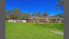  70 Princes Highway Helensburgh NSW 2508 Rarely Offered Ultimate Lifestyle Set on 5 acres this gorgeous colonial styled home with in-ground pool offers the perfect accommodation for you and your extended family. Leave the hustle and bustle of city life and come home to this beautiful lifestyle property. From the custom made animal enclosures, the fully fenced paddocks, dog run and the well-equipped stables, this property presents a once in a lifetime opportunity. Multi-functional property offers 5 tranquil acres  1 hour from Sydney CBD and 30 mins from Wollongong CBD 15 mins from the gorgeous Northern Illawarra beaches Just minutes from the Seacliff Bridge's Grand Pacific Drive 5 mins from Helensburgh offering all the modern day services Large Beechwood brick Colonial style single level home Large open plan Jarrah kitchen, dining and family room area Custom made Jarrah office furniture and formal lounge room Ducted air conditioning Double garage  In-ground swimming pool Outdoor paved area 5 Acres (approx.) Fully fenced backyard with dog run Separately fenced paddocks Custom made animal enclosures all with internal fencing  Small yards goat shed with shelves Chook pen with 3 pens for breeding, bunny shed. 3 9ft x 9ft stables, with the provision for auto watering Feed Shed Round yard 