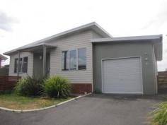  3/1-3 Palmers Road Latrobe Tas 7307 "PRACTICAL LIVING, MODERN FLAIR" * 3 Bedrooms with built in wardrobes* Open plan living area's* Practical modern kitchen with dishwasher, glass cooktops & rangehood* Split level design* Electric heating* Double glazed windows all round* Single garage* Sunny location* Close to hospital   
