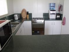  35 Ivy Street  Roma QLD 4455 Looking for that neat and tidy home with nothing to do in a quiet street? then this is it! 3 good size built-in bedrooms, great open plan living areas. Modern kitchen with new stove, pantry, 1 1/2 bowl sink and breakfast bar. Evaporative air conditioning throughout, gas bayonet for heater, fully screened plus security doors, linen and broom cupboards. Rain water tank and large garden shed, 2 bay carport, 6 ft colourbond fencing complete the outside picture. $337,000 
