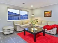  9 Grandiflora Grove Point Cook VIC 3030 Porter Davis stunner in enviable AlamandaSet among established properties in one of Alamanda's best streets, this striking five year-old (approx.) Porter Davis home offers quality and a stylish mix of formal and informal living spaces. Constructed with low maintenance living inside, the floorplan incorporates four good size bedrooms, three separate living zones and two entertaining areas outdoors.  - Four bedrooms, including the main with walk in wardrobe and en suite with stylish twin vanity and oversized shower. Bedrooms two, three and four are tucked away down a hallway; all with built in robes.  - Contemporary kitchen with striking red glass splashback, stone benchtops, 900mm stainless steel appliances, dishwasher and ample storage.  - Living areas are offered in abundance, including the formal lounge, meals/family area adjacent the kitchen and separate rumpus room. - Outdoor entertaining is a breeze with two decked areas, including an alfresco area and separate sun-drenched deck accessed via glass sliding doors.  - 28 squares of living including garage (approx.) set on 515m2 block (approx.) - Complete with luxury features including ducted heating, evaporative cooling, double garage with remote-controlled door and walk-through access to the backyard, fibre optic internet, water tank plumbed to toilets, high ceilings, alarm system, front and rear landscaped gardens, quality floor coverings and window furnishings, and more.  Located about 22 km from Melbourne's CBD in the Alamanda Estate (2010 UDIA National Residential Development) which includes a $6 million fully built and operational recreation and community centre, café, five hectares of wetlands, landscaped parks, stunning sculptures, walking and cycling tracks, child care facility and Alamanda State College. 