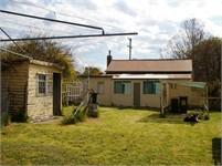  40 Plane Avenue Uralla NSW 2358 IDEAL INVESTMENT OPPORTUNITY • One bedroom weatherboard cottage with two sleep-out rooms. • Large lounge room with slow combustion wood heater. • Electric kitchen with adjoining dining room. • Bathroom with bath. Laundry and separate toilet. • Sunroom leading out to storage shed and single garage. • 915m² block just across from the Golf Club. View Sold Properties for this Location View Auction Results General Features Property Type: House Bedrooms: 1 Bathrooms: 1 Indoor Features Living Areas: 1 Outdoor Features Garage Spaces: 1 $160,000 