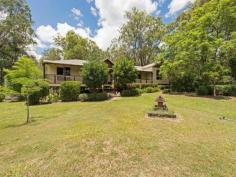  2-40 Bambling Road Boyland QLD 4275 “Horse Property with Sub-Division Potential” This fully renovated air-conditioned 4 bedroom home plus study or 5 bedrooms all with built-in robes, and 2 Bathrooms, the open plan design shows the extensive use of genuine Hoop Pine flooring with a gourmet kitchen that would impress the most fastidious of chefs, Stone work tops and stainless steel appliances. Outside there is a good sized Bull Nosed Veranda at the front of the house and a large entertainment area at the rear with a large detached 9X6 mtr double garage & workshop, a chook pen and sheds. This 12 Acre property has been set up as an “Equestrian Training Centre” the entire area is flat and fully usable with two good sized Dams full of fish and a Bore that will pump plenty of water when required, this makes the property totally draught free at all times. The 18 X 12 Stable complex currently has eight 4x4 mtr stables with room to double the capacity, with good sized Tack & Feed rooms plus a wash bay, and 2 side elevations that are suitable for farm equipment, tractors slashers etc. Adjacent to the Stables is a large round yard.  There are currently six Paddocks all set up for hot wire and ample room to double that amount of paddocks or install a 60 X. General Features Property Type: Acreage/Semi-Rural Bedrooms: 4 Bathrooms: 2 Land Size: 4.74ha (11.71 acres) (approx) Indoor Features Ensuite: 1 Living Areas: 2 Toilets: 2 Study Floorboards Broadband Internet Available Built-in Wardrobes Pay TV Access Dishwasher Reverse-cycle Air Conditioning Air Conditioning Outdoor Features Remote Garage Secure Parking Carport Spaces: 1 Garage Spaces: 2 Deck Courtyard Outdoor Entertaining Area Shed Fully Fenced Eco Friendly Features Water Tank Greywater System $810,000 Negotiable 