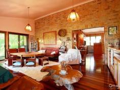  Uki, NSW 2484 3 Homes in one set on 6 Acres! Exclusive hilltop residence overlooking Mt Warning set on 6 private acres  * 4 bedrooms, main bedroom including ensuite with a spa, a private study and a library area  * 3 outdoor entertaining areas with private courtyard and 2 open veranda sitting areas  * Self-contained unit with separate power source which consists of its own bedroom, lounge room, kitchen, bathroom & laundry  * Kids wing has own bathroom and lounge area that can be closed off from the rest of the house  * Main wing of home includes a chefs kitchen with stainless steel bench tops, has large dining and lounge rooms  * Set on 23,860m2 this lot is just under 6 acres and has plenty of room for storing a caravan or boat  * 2 x 10,000 gallon water tanks giving 75,708Lts of water, with a dam also located on the property  * Property has separate garage with studio and workshop with 3 phase power to studio and house  All Inspections are by Appointment Only! 