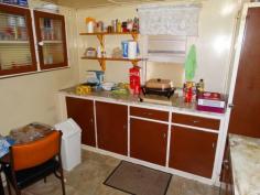  12 Best Street, Warra, QLD, 4411 HOUSE + HUGE SHED ON 2,024m2 The Vendor has moved on and needs this 2 bedroom timber home sold. Situated on a large 2,024m2 block in the township of Warra the property has town water connected, 3 x rain water tanks, power and mobile phone service.  Warra is a small township 30 mins from both Dalby and Chinchilla and has a primary school, school bus to Dalby high schools, post office and hotel. The shed has to be seen to be believed - 14mx9m with 3 large roller doors + 9m x 9m attached car accommodation with extra toilet. Power is connected and the floor is concreted.  Features of the home include: * Open eat in kitchen and lounge room with ceiling fan * 2 x bedrooms + sleep out. The main has built in cupboards and a ceiling fan * Bathroom and separate toilet * Downstairs laundry and extra storage room For further information contact the agent Warren Barker 0429 893 099. 