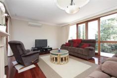 13 MACCABEAN AVENUE , DIANELLA WA 6059 OPEN SATURDAY 8th Nov 12 -12.30pm Set on 781 sqm of prime real estate, this charming home oozes natural light and huge potential. From the main entrance you walk through to the airy and open lounge room adorned with French Wooden windows and doors to let the natural light and elevated view stream in. The spacious open plan Tasmanian Oak kitchen overlooks the meals and living room which leads onto the private and luscious back garden complete with birds and trees and an all season covered alfresco. The home has been designed around capturing the elevated views of the Perth hills with balconies on all the front rooms. $909,000 to $949,000 