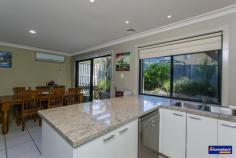  4 Wild Ash Way Westleigh NSW 2120 Easy Living Imposing and young 2 storey brick townhouse in the highly desirable Wild Ash Grove Estate which features resort like clubhouse and pool. Comprises of 4 spacious bedrooms all with built in cupboards and ensuite in main. Open plan formal lounge and dining area with quality tiled floor coverings. Modern kitchen with granite benchtop, stainless apliances, natural gas cooking and breakfast bar  Additional features alarm system, air conditioning and remote garage door and gas heating. Private and easy care courtyard with timber pergola. Close proximity to rail, shops and Thornleigh and Normanhurst West primary School. To Be Auctioned on Site Saturday 6th December 2014 @ 1pm. 