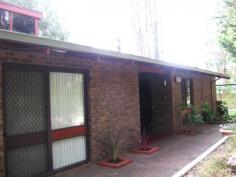  10 NORTHWARD ROAD, ROLEYSTONE, WA 6111 FOR SALE: BUYERS ABOVE $565,000 A gentle sloping driveway from the road leads to the front of home along a gentle walk of bricks to a terrace and sheltered PORCH . Step through a decorated carved door with side glass panel into the FRONT RECEPTION HALL . A place to welcome and farewell family and friends. FULLY FENCED REAR GARDEN pens the family pets and keeps young children confined and closer to the family living areas of the home. 