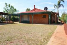  30 Nemesis Pl South Kalgoorlie WA 6430 Love the outdoors? Dont miss out on viewing this fantastic family home with lovely sweeping verandas and beautiful established lawns and gardens.  This freshly painted, modern family home features 4 double sized bedrooms, 1 large family bathroom with separate bath and shower, new vanity and storage cupboard. The open plan living, dining and kitchen is bright with large windows overlooking the beautiful veranda and gardens. The kitchen is bright and functional with gas oven, pantry, double sink and breakfast bar. The open plan area also offers a tile fire for the eventual cold winter nights and for the hot days around the corner ducted air-conditioning to all living and bedrooms. The outdoors ticks all the boxes with a good sized grassed area and huge sandpit for the kids to play, an external games room with patio for the adults and a large 6m x 6m powered shed for the tools and toys this property has it all. Located close to Primary and Secondary Schools, local IGA and Oasis don't miss out on the opportunity to own this lovely home. Contact Tom today on 0418 952 548 