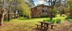  51 Church St Burrawang NSW 2577 4 Bedrooms For Sale : $749,000 HIGHLANDS COTTAGE Situated in the historic township of Burrawang, this two-level cottage has so much character to offer ... external shingles, vaulted ceilings, two fireplaces plus slow-combustion fire, polished boards, English paned windows and more! There are four bedrooms, two living areas, a study space and a mezzanine above the lounge, as well as a country-style eat-in kitchen with welcoming corner nook. Every window offers leafy views of the English-style garden with stepping stones and enchanting places to sit and ponder. The home faces due north and catches tons of winter sun. The large ¾-acre block and a double auto garage complete this attractive package. Just listed today! Viewing by appointment. Outgoings per annum:  Council: $ T.B.A  Water:  $ T.B.A 