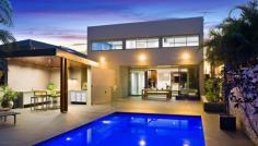  25 Tunstall Ave Kingsford NSW 2032 An unrivalled architectural masterpiece on 758sqm
 Perfectly placed in one of Kingsford / Kensington's most 
prestigious locations is this luxurious residence. With sweeping views 
that stretch from Botany Bay to the Blue Mountains and flowing over 
three unparalleled levels this solid contemporary family home has been 
appointed with quality of finishes throughout. Designed to create 
absolute opulence this is arguably the area's finest property. - Selection of formal and informal living / dining areas - Stunning Caesar stone kitchen with island breakfast bar and butlers kitchen / pantry - Home theatre room, gymnasium, office, ample storage, additional powder room - Manicured backyard complete with alfresco entertaining area, cabana and heated swimming pool - Master bedroom with huge walk-in wardrobe, en-suite and exclusive terrace balcony - Triple lock up garage with workshop area, video intercom, reverse cycle air, spotted gum timber flooring - Total floor area: 650sqm includes balconies (approximately) -
 Conveniently situated within moments of Centennial Park, CBD, Sydney 
airport, various golf courses, Westfield shopping centre and Coogee 
Beach - Land size 758 sqm Approximately - Council: $728 per quarter - Water: $176.56 per quarter - Jason Black 0414 891 797 or Brent Foster 0411 032 474
 