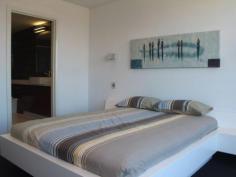  VOGUE APARTMENT 
 Ready to enjoy is this two bedroom apartment situated on level 5 and
 offered fully furnished with quality appointments. Surrounded by light,
 this 165 sq metre apartment benefits from breezes from three sides and 
features both north and south facing balconies. Lovely views northwards 
and across shimmering Tuggerah Lakes, there will always be water 
activities to observe. Superbly suited as a holiday base, the garage 
area will comfortably accommodate a jet ski or small boat in addition to
 two cars. 
 
   
 
 Property Snapshot 
 
 
 
 Property Type: 
 Unit 
 
 
 Construction: 
 Brick 
 
 
 Features: 
 
 Balcony 
 Brand New 
 Built-In-Robes 
 Close to beach 
 Close to lake 
 Close to schools 
 Close to Transport 
 Ensuite 
 Lift in complex 
 Remote Control Garaging 
 Security Complex 
 Waterview Read more at http://theentrance.ljhooker.com.au/EK3F7M#cp85fidYj5XrmR5q.99 