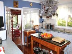  94 Peet Road, ROLEYSTONE, WA 6111 FOR SALE: BUYERS ABOVE $525,000 CHARM WITH A CAPITAL"SEE".. ..Set on half an acre with delightful gardens and coastal views, this weatherboard clad and tin home has the warmth of a relaxing retreat. Open french doors from entrance hall and step into a charming living room, with fireplace, that radiates hospitality and says “stay a while!”. Merging through to formal dining where guests will leisurely dine, not merely eat, and open rear French doos onto viewing deck and entertaining alfresco area for summertime enjoyment. 