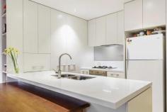  103/7-11 Berkeley Street Doncaster VIC 3108 Live it Up - Only 1 Year Young At just 1 year young, this stunning, elevated 2 bedroom 2 bathroom ground floor apartment presents you with exceptional space, luxury and convenience. Perfect for investors, young families, retirees and professionals, put the car away in the secure basement car space and walk to Westfield (at the end of the street), local restaurants, Doncaster Primary, cinemas, library, kinder, transport and Doncaster Secondary College - with no major intersections to cross. Entry is via secure video intercom. An entry hallway introduces surprising space, comfort and functionality, where natural light, high ceilings, parquetry floors and two luxury bathrooms with marble benchtops and floor-to-ceiling tiles make a fashionable statement. Discover 2 double bedrooms (fitted BIRs and split systems) and a deluxe bathroom; the master suite boasts a sleek ensuite. An open study and Euro-style laundry is also handy. You'll love to cook in the gourmet kitchen showcasing stone benchtops, s/s Smeg appliances (dishwasher), island bar and excellent storage. Designed with an easy indoor/outdoor lifestyle in mind, the spacious living and meals room has glass sliding door access to the wrap-around balcony (roofed) ... show more View Sold Properties for this Location View Auction Results General Features Property Type: Apartment Bedrooms: 2 Bathrooms: 2 Outdoor Features Garage Spaces: 1 FOR SALE 