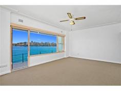  2/11a Oyama Avenue Manly NSW 2095 HARBOURFRONT PARADISE To live on the foreshores of Sydney Harbour, looking across a view-swept swimming pool and beautifully manicured harbourfront lawn, must be the ultimate dream. Just a short stroll from Manly's ferry terminal, at the end of a quiet seaside cul-de-sac, this spacious 2 bedroom Waterfront apartment presents a wonderful Lifestyle opportunity.  Part of a small boutique building, with secure garaging and sandy beaches just footsteps away, this property enjoys breathtaking main harbour views to Forty Baskets Beach and beyond.  The sunny aspect and prime front-row position enjoy a never-ending parade of yachts and pleasure-craft where you'll really have to pinch yourself to believe it's all yours... Seeing is believing ! *** BE SURE TO VIEW OUR AMAZING 2min VIDEO TOUR ONLINE AT maxwalls.com/id178 