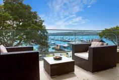  4/585 New South Head Road Rose Bay NSW 2029 Property Description Harbourfront Glamour With Panoramic Views, House-Like Proportions & Bespoke Inte A fresh vision of urban glamour with a chic New York inspired design aesthetic, this custom recreated harbourfront apartment is set against a mesmerising harbour backdrop with panoramic northerly views over Rose Bay Marina. With nods to Hollywood and its Art Deco heritage, it has been meticulously recreated showcasing exceptional detail throughout from the state-of-the-art kitchen and luxurious marble bathrooms to the bespoke joinery and timber-panelled walls. Facing north and opening through double glazed glass to a view-swept terrace, it features a semi-like layout with more than 130sqm of in/outdoor living space. Mid floor setting in a revamped Art Deco block of 8 Exclusive harbourside setting overlooking Rose Bay Marina  Fluid open living and dining, Kelly Wearstler wallpaper Custom entertainer’s island kitchen, fully integrated Wraparound terrace with never-to-be-built-out views 3 double beds with built-ins, luxurious master suite  2 luxurious baths featuring Calcutta & Carrara marble finishes Internal laundry, integrated sound, ducted reverse air Walnut polished timber floors, terrazzo foyer, lift access 
