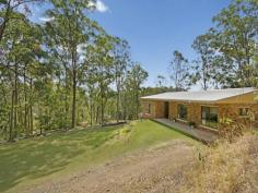  261 Ninderry Road,
Ninderry
Qld
4561 Located at the back of 1.185 ha of land with a well formed driveway giving easy access, sits this brick home. The home has three built in bedrooms and a newly renovated bathroom. The sunken lounge room is a good size with a wood heater for the winter months and just recently, a reverse cycle air conditioner added. The kitchen and loungeroom have brick feature walls. Combined dining and kitchen From this room you have views to the Blackall Ranges. The house would benefit greatly with the addition of a deck off the lounge room and car accommodation under. Two rainwater tanks and also an extra toilet outside. The land is fully fenced with a mixture of open land and treed areas. Sale Details$459,000 
