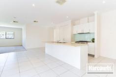  18 Waterbury Street Cranbourne VIC 3977 Ex-display modern inspired living showcases design excellence thru this four bedroom plus entertainer's floor plan. Without compromise this immaculate family home offers spacious formal and informal living, generous robed bedrooms with a stunning kitchen and dining area. 560 square metre allotment, remote control double lock up garage with rear access, ducted heating/cooling, alarm, led downlights , caesarstone bench tops to kitchen and vanity top to bathrooms and heaps of extras this superbly located home in the Carlisle Park Estate! With a bus stop nearby, only moments from Primary School and Lyndhurst College, short drive to Monash freeway entrance, minute's walk from the Shopping precinct this family home has been designed ready for you to enjoy your lifestyle NOW! - See more at: http://cranbourne.harcourts.com.au/Property/587805/VCR24676/18-Waterbury-Street#sthash.xCS4XMI1.dpuf 