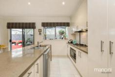  1/4 Grieve Parade Altona Vic 3018 Contemporary & Luxurious Beachside Living!! 
								
								 
									
										 
											
										 
										 
											4
										 
									
										 
											
										 
										 
											3
										 
									
										 
											
										 
										 
											2
										 
									
								 
								
								
								 
									This recently built 2 storey townhouse, perfectly positioned 
just a stones throw from Altona Beach, is modern and luxurious living at
 it's finest. Comprising of 4 spacious bedrooms all with built in 
robes, master with walk in robe and private ensuite, bedrooms 2 and 3 
with semi ensuites, 2 x centrally located bathrooms, open plan kitchen, 
living and dining opening out to a decked alfresco area. Other 
features include caesar stone bench tops with stainless steel appliances
 in kitchen, double garage with internal access and all within walking 
distance to public transport (Westona Station) Altona Beach and nature 
reserves and Pier St shops and eateries. Also with easy access to major freeways, the Melbourne CBD is just a short trip away. Contact Mancini today to arrange your private inspection - INSPECT 7 DAYS BY APPOINTMENT. Land Size: 296m2 approx.  
								 