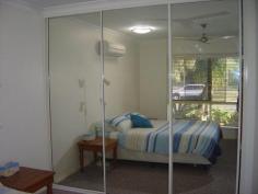  2/
	29 Barramundi Drive,	
	WOODGATE QLD 4660 Situated in Barramundi Drive WOODGATE BEACH this ground floor two bedroom unit has pleasant views over adjacent parkland and has some OCEAN GLIMPSES as a bonus. The parkland opposite the complex is the starting point for kilometres of paved cycling / walking paths which run the full length of the esplanade and beyond, connecting recreation areas to shopping precincts, Bowls Club with restaurant, boatramp, hotel etc. The beach (pictured) is only 150 metres from the property and is easily accessed via walkways through the natural dune vegetation. The ground floor residence is on the northern side of the complex and consists of:- * Open plan roomy lounge / dining area (airconditioned) * Central kitchen with loads of storage * Two bedrooms (built-in robes plus ceiling fans) * Master bedroom is of generous proportions and is airconditioned * Good size bathroom plus seperate toilet * Internal laundry * Patio areas both front and rear * Single lock-up garage $395,000 