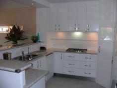 1/21 King Street Paynesville VIC 3880 FIRST CLASS - WATERFRONT TOWNHOUSE WITH JETTYImmaculate waterfront home with jetty. Ideally located in the heart of Paynesville and within walking distance to shops, lake, local cafes and restaurants. Very well appointed with quality finishes throughout, open plan living with new kitchen which overlooks the water, front deck for entertaining, three bedrooms, the master has ensuite and enjoys views of the canal, bathroom, separate laundry, fully ducted heating/cooling, car garage and carport. Lovely private rear courtyard with mature trees and shrubs. Only minutes by boat to McMillan Strait. 